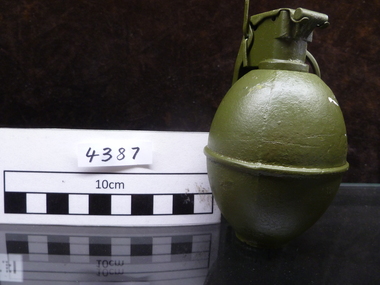 A replica of a M26 hand grenade.