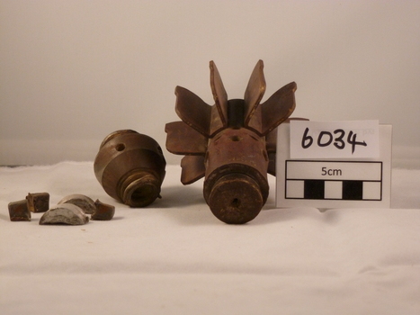 Pieces of a mortar bomb tail fin