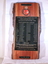Red ironbark piece of timber with a metal inlay listing names of soldiers who lost their lives in Vietnam.  