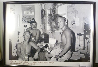 A Framed Black and White Photograph of Three Soldiers - Christmas 1969