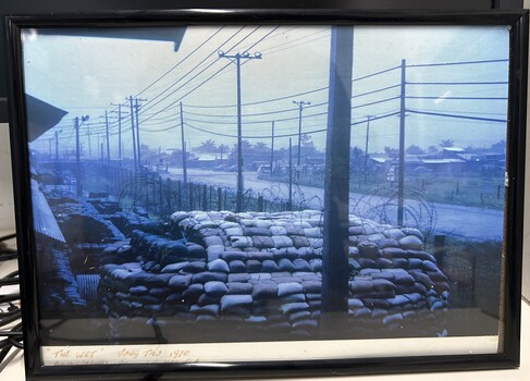 A Framed Coloured Photograph - The Wet -Vung Tau 1970