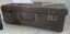 Brown card board small case that with carry handle and locking catches.