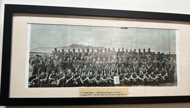 A Black and White Photograph of A Field Battery Celebrating 100 Years of Service
