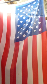 United States of America Flag represents military, health, construction, education, and industry aid.