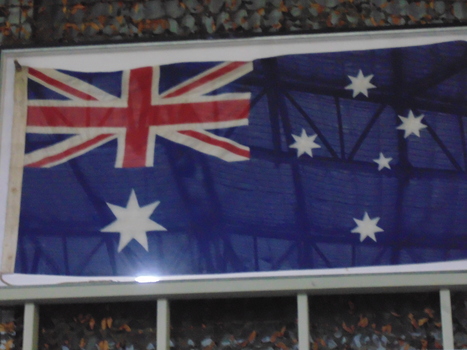 Image of royal blue Australian flag in white frame.