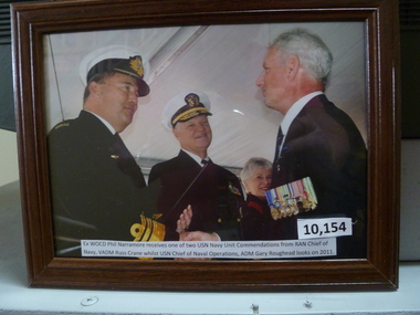Photograph, Ex WOAudio, CD Phil Narramore receives one of two USN Navy Unit Commendations etc