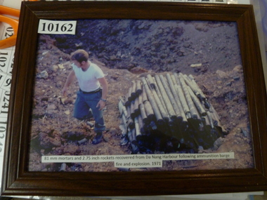 Photograph, 81mm mortarts and 2.75 inch rockets recovered from Dan Nang harbour after ammunition barge fire 1971