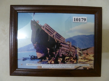Photograph, Remains of 154 tonne ammunitions barge set ablaze whilst Audio, CDT-3 members on board on their way to Da Nang harbour