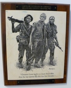 Black etched picture of three US servicemen in field