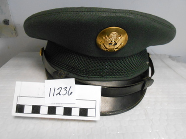 Enlisted Officer's Hat -USA. US military badge on front with yellow lining