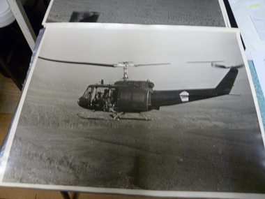 Photograph, A3 Photo of US Army Huey Helicopter in Flight, 1968