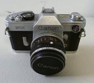 A Canon silver and black camera