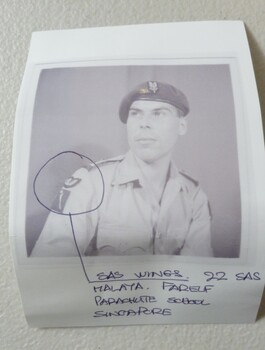 Black and white photograph of Capt. Peter Raymond Young in a beret and uniform