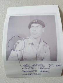 Black and white photograph of Capt. Peter Raymond Young in a beret and uniform