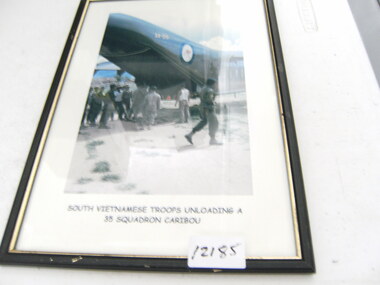 Photograph, South Vietnamese troops unloading a 35 SQN Caribou