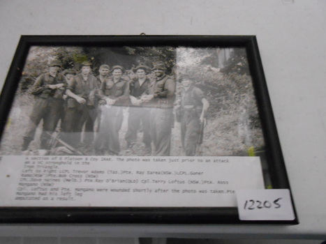 A black and white photo of 8 soldiers from 6 Platoon B Coy 1RAR.