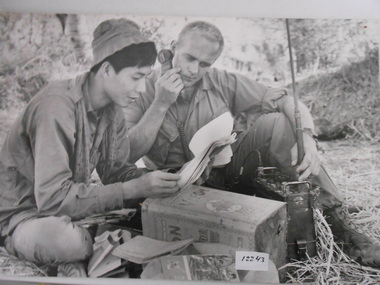 Photograph, Enemy Documents - Interpreter, 1/03/1968 12:00:00 AM