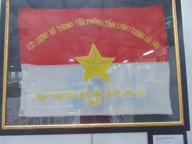 Framed embroidered Viet Cong flag.  