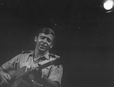 L/Cpl Normie Rowe in the studio at the US Army's Armed Forces TV Studio representing Australia on the 1969 Armed Forces Christmas Show. 