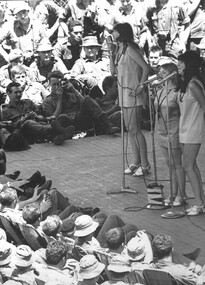 A photograph of Singers Judy Condon, Maureen Elkner and Pauline Murphy of the Official April - May 1969 Melbourne Concert Party entertain the diggers.