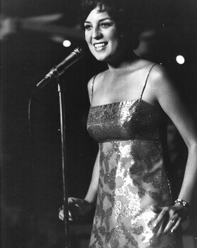 Susan Wills of the Will Sister with the Official February-March 1970 South Australian Concert Party performs for patients at the 1st Australian Field Hospital.  