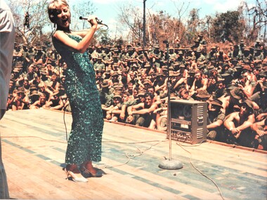 A photograoh of Lead Act with the ABC Dance Band Concert Party Lorrae Desmond at ATF Nui Dat in March 1967 