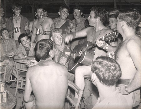 A photograph of Cpl Normie Rowe's last night in Vietnam prior to completing his year on active service.