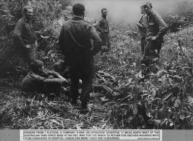 A photograph of diggers from 1 Platoon, A Comp, 8 RAR on Operation Atherton, N.W. of the Australian Task Force Base at Nui Dat. 