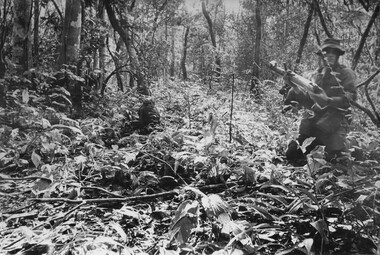 A photograph of Platoon strength N.W. of 1ATF 'Operation Atherton' 10 December 1969. 1 Platoon, A Company,  8 RAR. under fire.