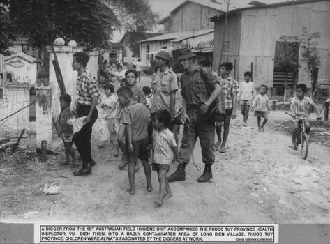 A photograph of a digger from the 1st Australian Field Hygiene Unit accompanies the Phuoc Tuy Province Health Inspector Vu Dien Thien. 