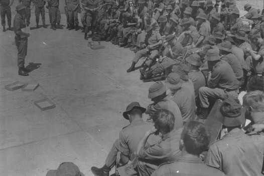 Diggers from 1st  ATF Nui Dat, are briefed by the Provost Marshall on what is expected of them whilst on R & C. 