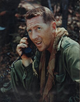 Maj Harry Smith MC, CO, D Coy, 6th Battalion, RAR at the Battle of Long Tan, directs a resupply during Operation Portsea. 