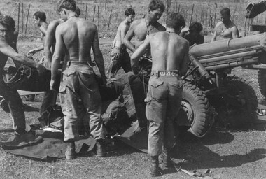 Gunners of the 103 Battery, RAA prepare their guns and equipment for movement by US Army CH47 Chinook helicopters to a fire support base. 