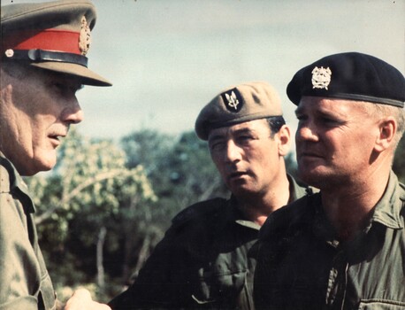 A photograph of General Sir Thomas Daley, Chief of the General Staff, talking with th Commanding Officer of the 1st Armoured Regiment. 