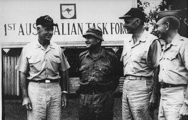 Brig C.M "Sandy" Pearson meets with the Admiral commanding the United States 7th Fleet upon his arrival at 1st Australian Task Force.