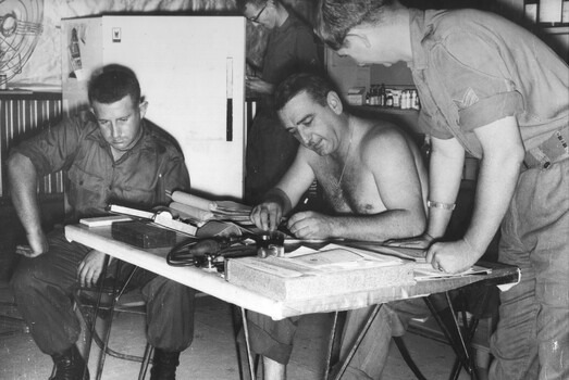 A photograph of the Commanding Officer and resident Medical Officer at the 2 Field Ambulance Hospital at the 1st Australian Task Fforce. 