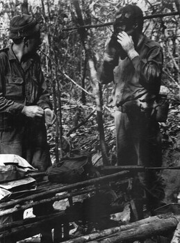 1st Australian Task Force Base, Engineer 'Tunnel Rats' don gas masks to check out NVA/VietCong bunkers and their connecting tunnels. 