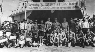 A Group photo of the placed runners in the 5000 metre footrace from the market place at Long Dien run on the Vietnamese National Day.