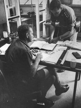 Capt John Knowles at the 1st Australian Field Hospital, discusses the supply of some medal ribbons with his WO for issue to some members. 