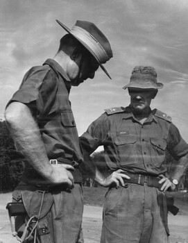 The Commander, Australian Force, Vietnam, Maj Gen Doug Vincent whilst waiting at Kanga pad for his personal helicopter..