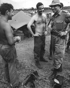 Brig Stewart Weir MC, 1st ATF Commander shares a joke with Engineers repairing a bridge on Vietnam's National Route 23. 