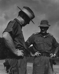 Brig. Stuart Graham, 1st ATF Commander discusses some problems with the Commander, Australian Force Vietnam,  Maj Gen Doug Vincent at "Kanga Helicopter Pad" 