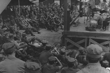 Digby Richards and his show entertain US troops at a Fire Support Base North East of Danang in Northern South Vietnam. 