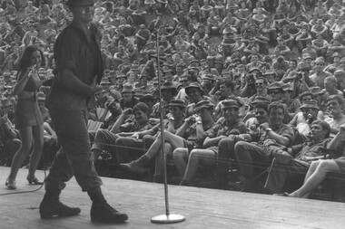 Erica De Wit a lead singers with the Official Apr-May 70 Sydney Concert Party and an Engineer Digger entertain the troops. 