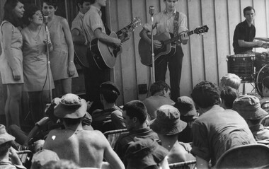 Diana Dalton, Judith Little and Janice Voss harmonise at the Official Jun 69 Tasmanian Concert Party with the backing of musicians.