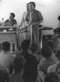 At the 1st Field Hospital, Johhny O'Keefe and his rock and roll band present a morning of music for the wounded and sick diggers. 