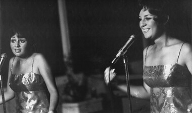 The Wills Sisters, one of headline acts with the official Feb-Mar 69 South Australian Concert Party perform at the RAAF Air Base.