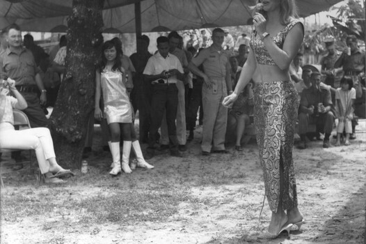 Lead singer Shirley Simmons, of her own Shirley Simmons Concert Party, entertains on the lawn of the AATTV  on Anzac Day 25 April 1967. 