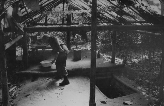 A digger checking out a doctors quarters at the NVA Vietcong K76A hospital.