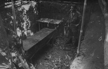 A Digger checks one of eight in ground operating theatres near the wards at the NVA/Viet Cong  K76A Hospital.